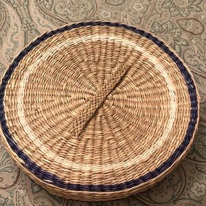 Pottery barn placements (six) in a lovely matching ratan basket.
